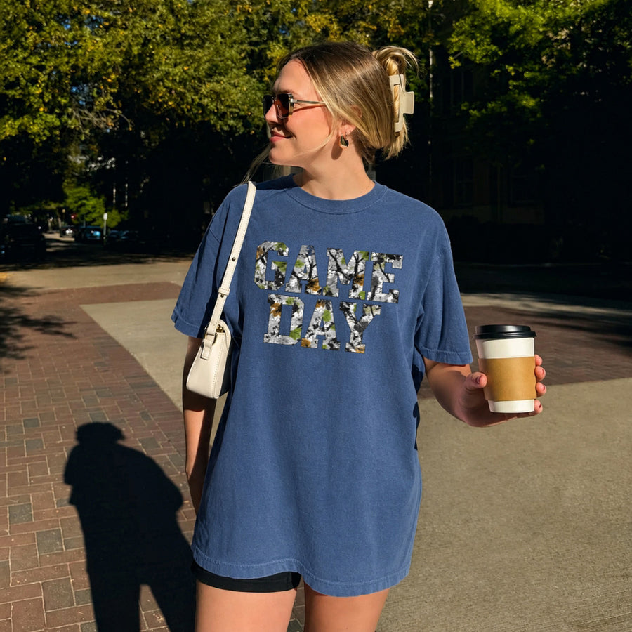 May include a Game Day Comfort Colors Camo Print Football Season Tee featuring a bold camo-inspired game day design.