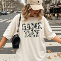 May include a Game Day Comfort Colors Camo Print Football Season Tee featuring a bold camo-inspired game day design.