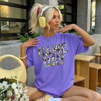 May include a Game Day Comfort Colors Camo Print Football Season Tee featuring a bold camo-inspired game day design.