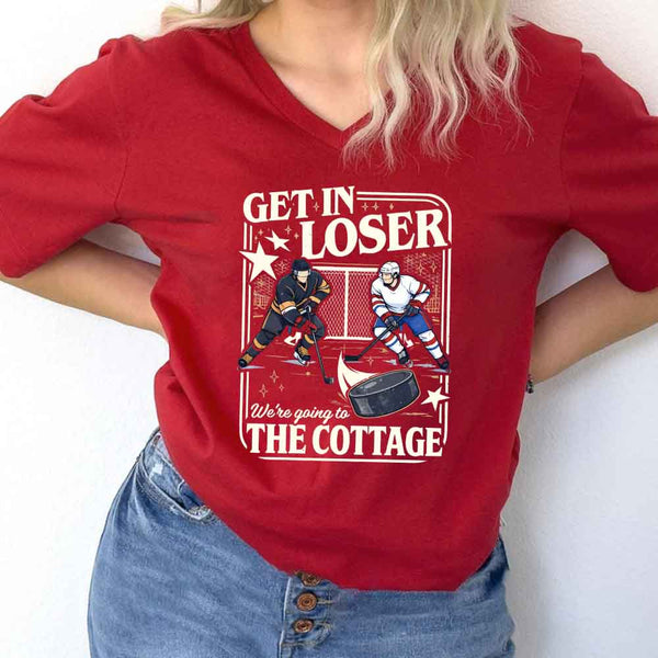 May include Get In Loser, We're Going to the Cottage v-neck tee with hockey romance BookTok graphic and relaxed fit