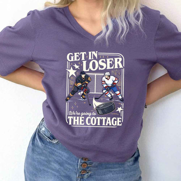 May include Get In Loser, We're Going to the Cottage v-neck tee with hockey romance BookTok graphic and relaxed fit