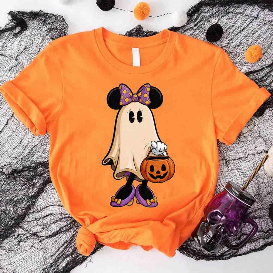 Orange t-shirt with a ghost character holding a pumpkin on a Halloween-themed background