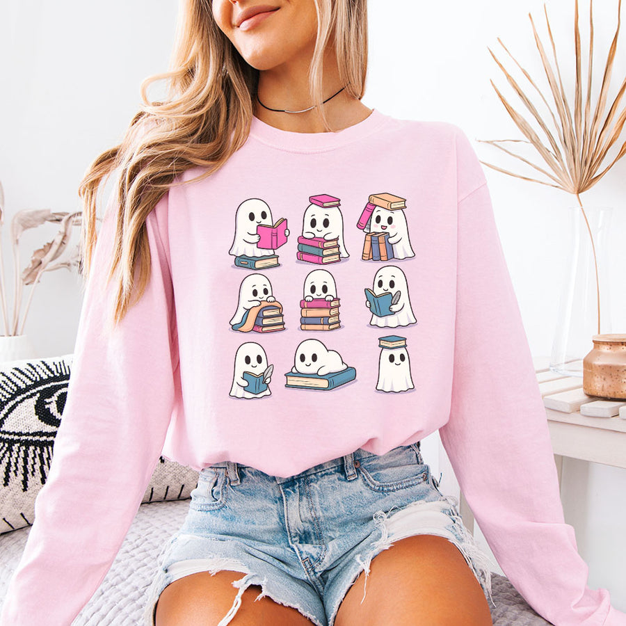 May include Ghost Reading Comfort Colors Halloween long sleeve shirt with ghost reading a book graphic, garment-dyed cotton, and relaxed unisex fit
