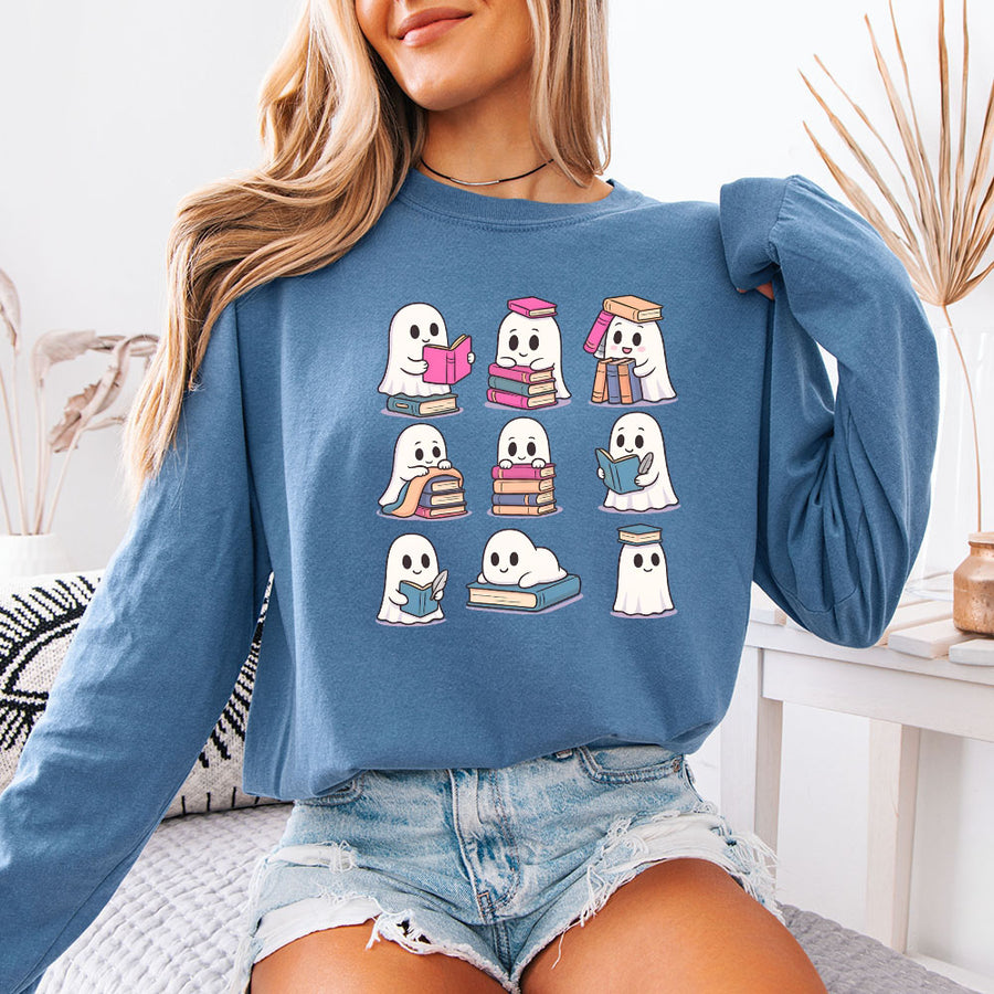 May include Ghost Reading Comfort Colors Halloween long sleeve shirt with ghost reading a book graphic, garment-dyed cotton, and relaxed unisex fit