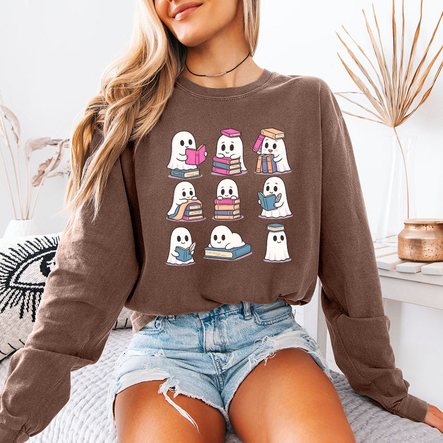 May include Ghost Reading Comfort Colors Halloween long sleeve shirt with ghost reading a book graphic, garment-dyed cotton, and relaxed unisex fit