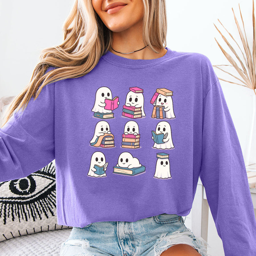 May include Ghost Reading Comfort Colors Halloween long sleeve shirt with ghost reading a book graphic, garment-dyed cotton, and relaxed unisex fit
