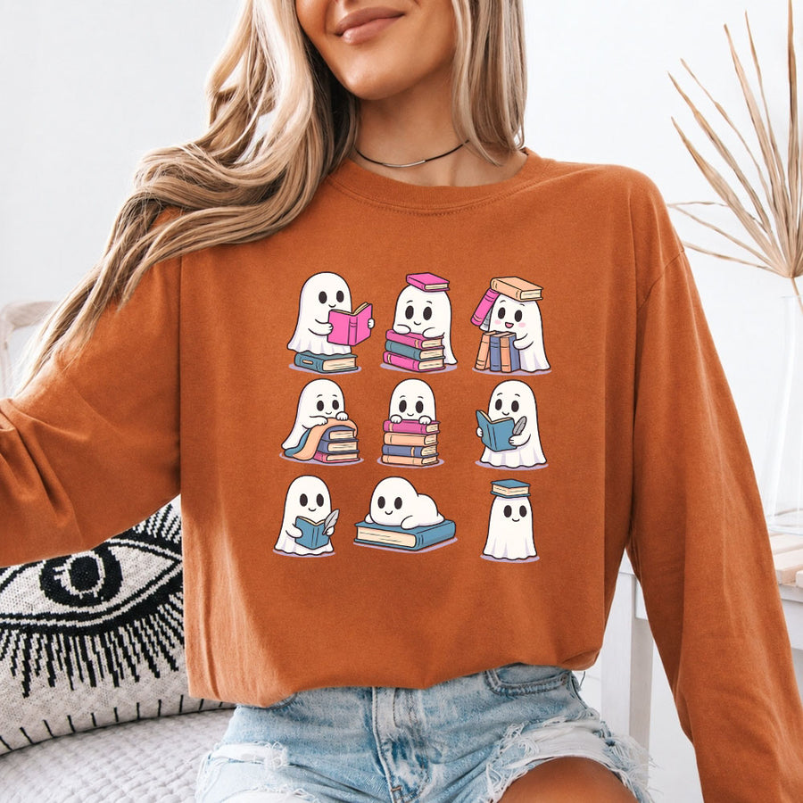 May include Ghost Reading Comfort Colors Halloween long sleeve shirt with ghost reading a book graphic, garment-dyed cotton, and relaxed unisex fit