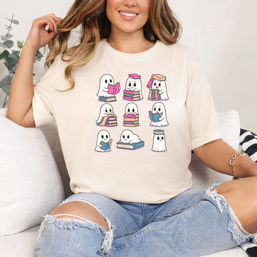 May include Ghost Reading Halloween shirt with cute ghost reading a book graphic, classic unisex fit, and soft cotton fabric