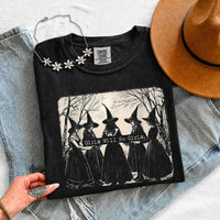 May include Girls Will Be Girls Comfort Colors Halloween t-shirt with festive graphic and relaxed unisex garment-dyed fit