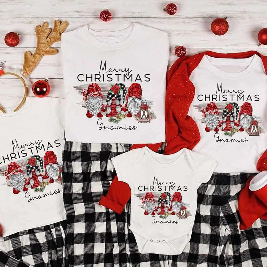 May include a Christmas baby onesie featuring a cheerful gnome family design.
