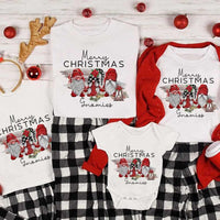 May include a Christmas baby onesie featuring a cheerful gnome family design.