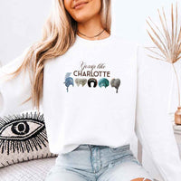 May include Gossip Like Charlotte Wigs crewneck sweatshirt with elegant period drama graphic and cozy unisex fit
