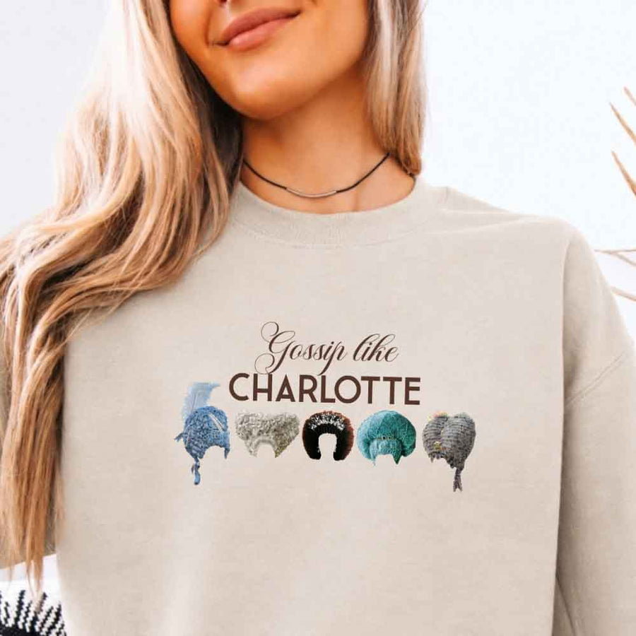 May include Gossip Like Charlotte Wigs crewneck sweatshirt with elegant period drama graphic and cozy unisex fit