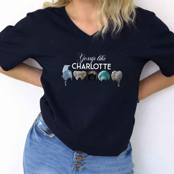 May include Gossip Like Charlotte Wigs v-neck tee with Regency romance BookTok graphic and relaxed fit design