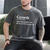 May include a unisex graphic t-shirt featuring the word “Growth” presented as a dictionary-style definition, paired with clean typography and an uplifting message that emphasizes progress, learning, and personal development.