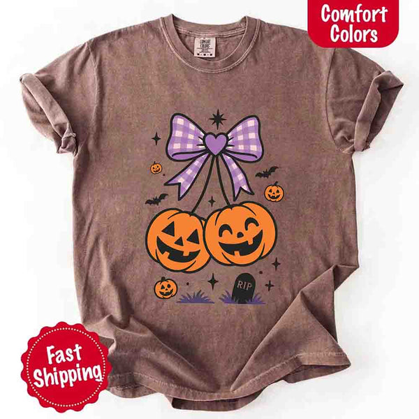 May include Halloween cherries graphic with two jack-o’-lantern pumpkins tied by a purple plaid bow, surrounded by bats, stars, and gravestone – cute spooky shirt design.