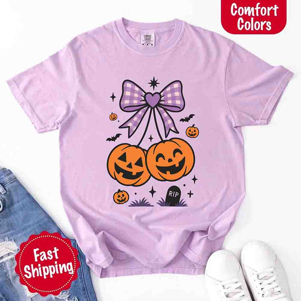 May include Halloween cherries graphic with two jack-o’-lantern pumpkins tied by a purple plaid bow, surrounded by bats, stars, and gravestone – cute spooky shirt design.