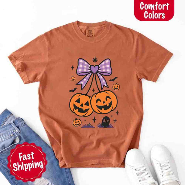 May include Halloween cherries graphic with two jack-o’-lantern pumpkins tied by a purple plaid bow, surrounded by bats, stars, and gravestone – cute spooky shirt design.