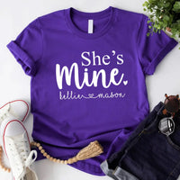 May include matching unisex t-shirts with “He’s Mine” and “She’s Mine” text and personalized names Team purple