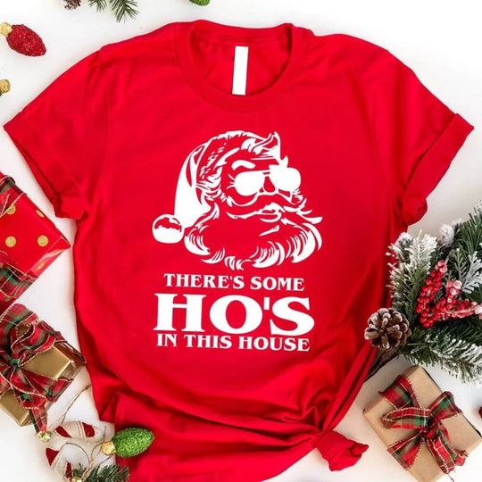 May include an image of the “Ho’s In This House” Christmas T-shirt featuring a humorous holiday graphic printed on a soft unisex cotton tee.
