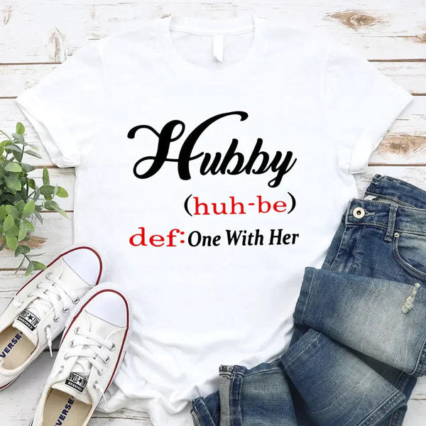 May include Hubby text graphic with definition style design, showing ‘Hubby (huh-be) def: One With Her’ in bold white font – Christian inspirational shirt.