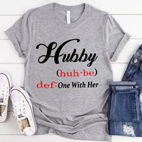 May include Hubby text graphic with definition style design, showing ‘Hubby (huh-be) def: One With Her’ in bold white font – Christian inspirational shirt.