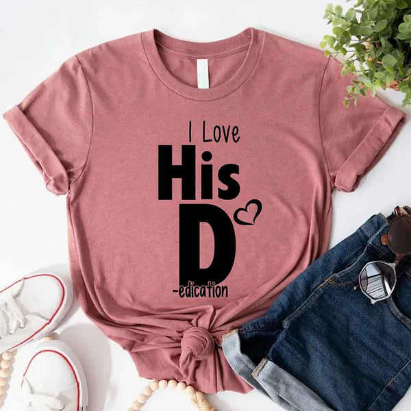 May include a funny matching couples t-shirt set showing “I Love Her P” and “I Love His D” designs printed on soft cotton fabric.
