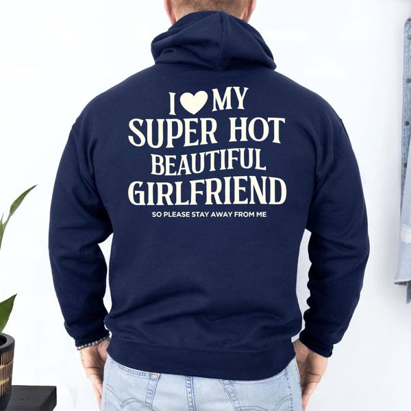 May include a pullover hoodie with the phrase I Love My Super Hot Beautiful Girlfriend printed at the back.