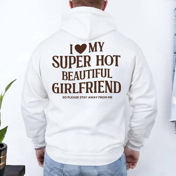 May include a pullover hoodie with the phrase I Love My Super Hot Beautiful Girlfriend printed at the back.