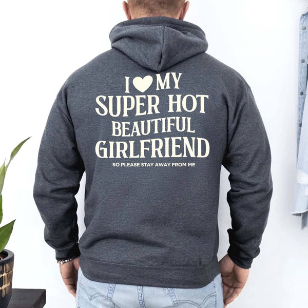 May include a pullover hoodie with the phrase I Love My Super Hot Beautiful Girlfriend printed at the back.