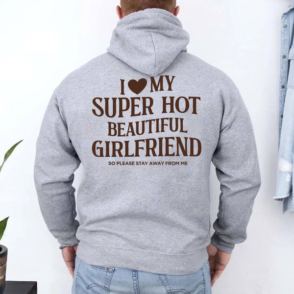 May include a pullover hoodie with the phrase I Love My Super Hot Beautiful Girlfriend printed at the back.