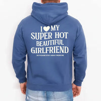 May include a pullover hoodie with the phrase I Love My Super Hot Beautiful Girlfriend printed at the back.