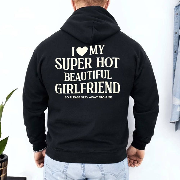 May include a pullover hoodie with the phrase I Love My Super Hot Beautiful Girlfriend printed at the back.