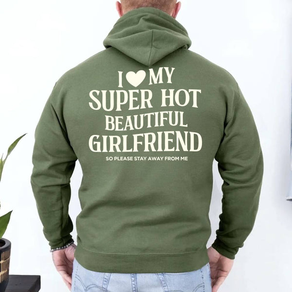 May include a pullover hoodie with the phrase I Love My Super Hot Beautiful Girlfriend printed at the back.