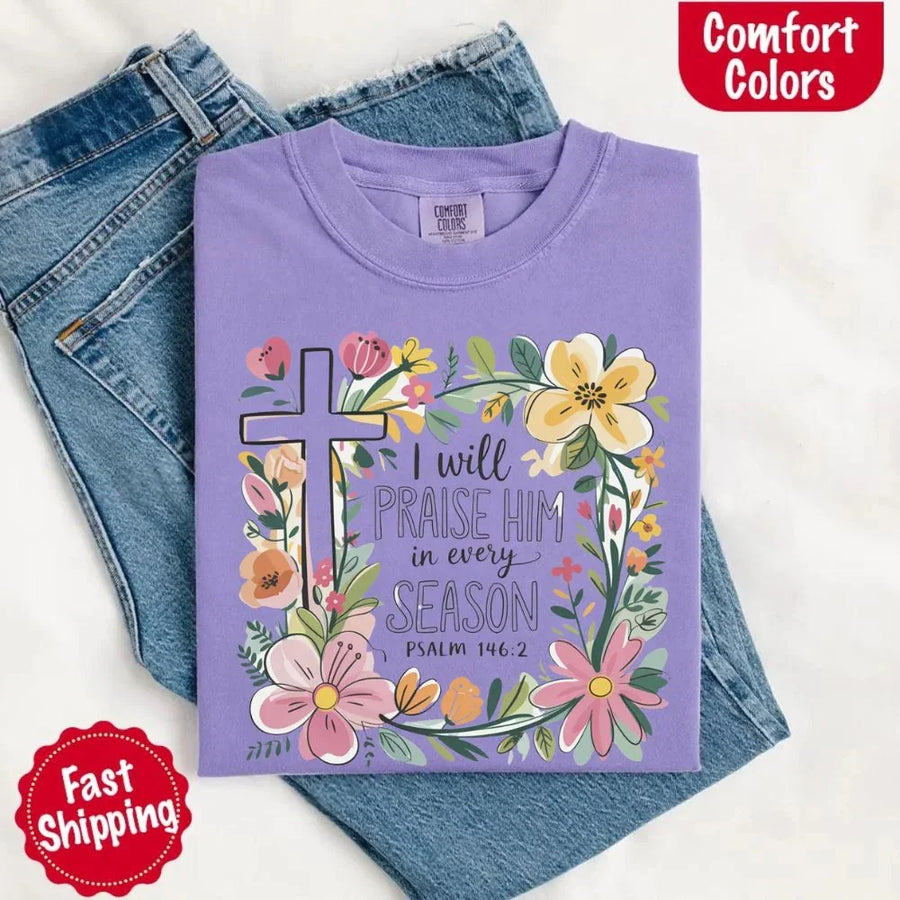 May include bold typography with a floral cross and the phrase “I Will Praise Him in Every Season,” reflecting faith and devotion through every stage of life.