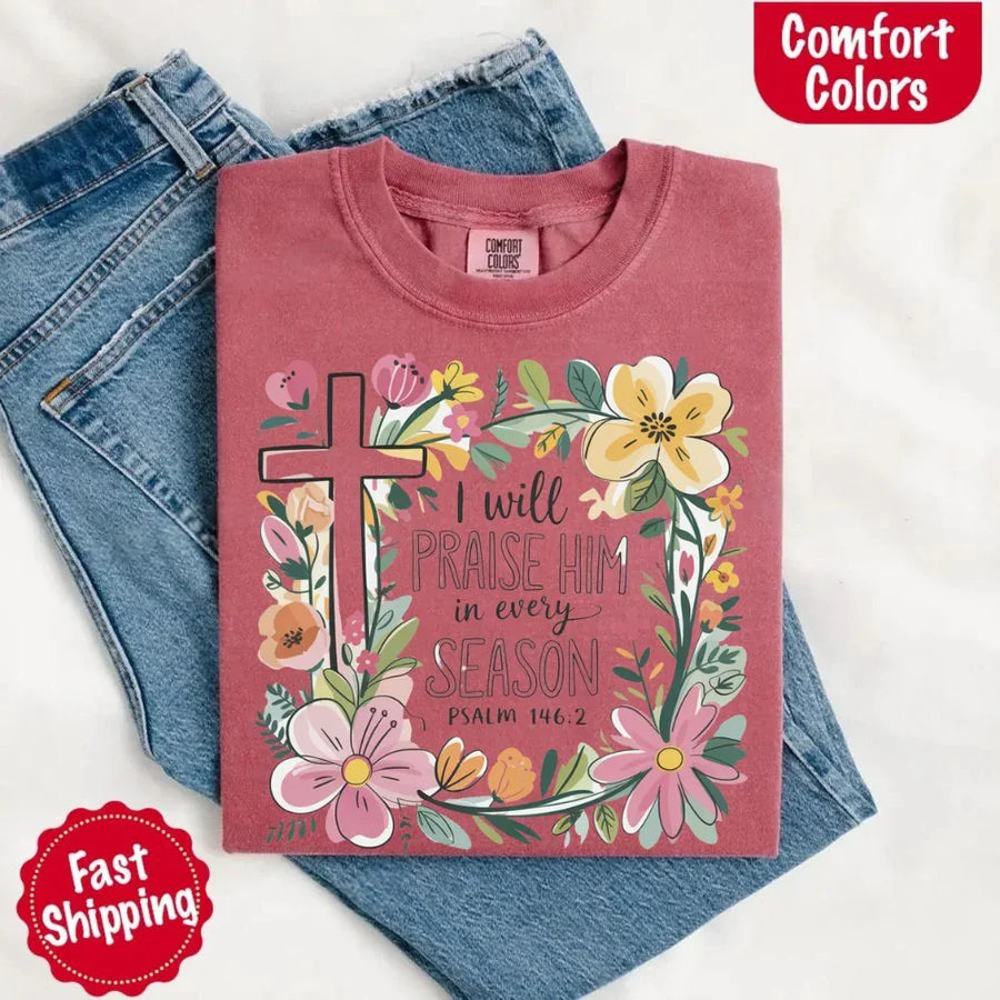 May include bold typography with a floral cross and the phrase “I Will Praise Him in Every Season,” reflecting faith and devotion through every stage of life.