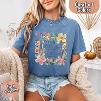 May include bold typography with a floral cross and the phrase “I Will Praise Him in Every Season,” reflecting faith and devotion through every stage of life.
