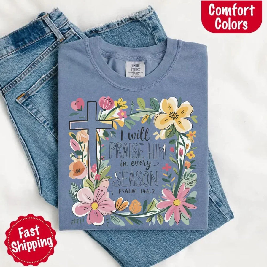 May include bold typography with a floral cross and the phrase “I Will Praise Him in Every Season,” reflecting faith and devotion through every stage of life.