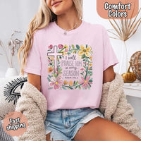 May include bold typography with a floral cross and the phrase “I Will Praise Him in Every Season,” reflecting faith and devotion through every stage of life.