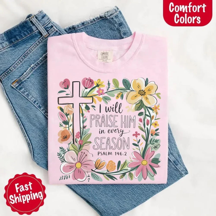 May include bold typography with a floral cross and the phrase “I Will Praise Him in Every Season,” reflecting faith and devotion through every stage of life.