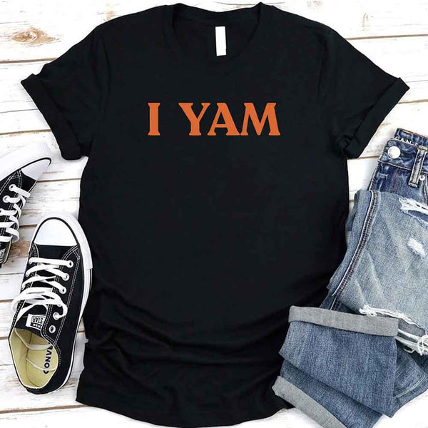 May include an I YAM T-Shirt with a funny Thanksgiving pun design, styled for holiday dinners and festive fall gatherings.
