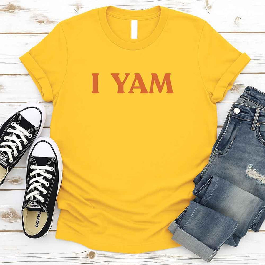 May include an I YAM T-Shirt with a funny Thanksgiving pun design, styled for holiday dinners and festive fall gatherings.