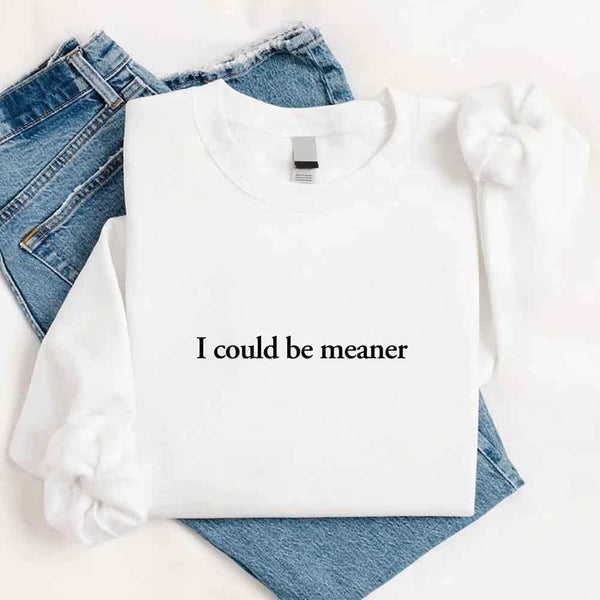 May include sarcastic “I Could Be Meaner” text printed on a classic unisex fleece crewneck sweatshirt