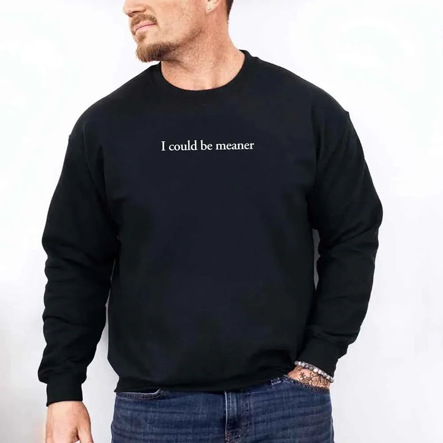 May include sarcastic “I Could Be Meaner” text printed on a classic unisex fleece crewneck sweatshirt