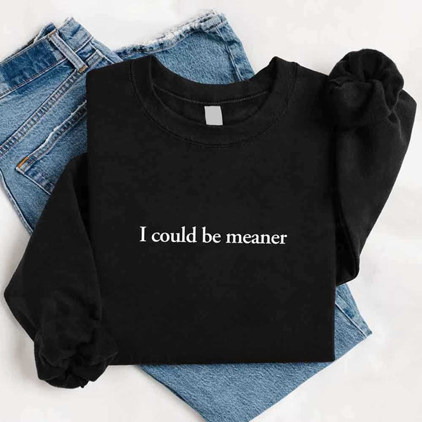 May include sarcastic “I Could Be Meaner” text printed on a classic unisex fleece crewneck sweatshirt
