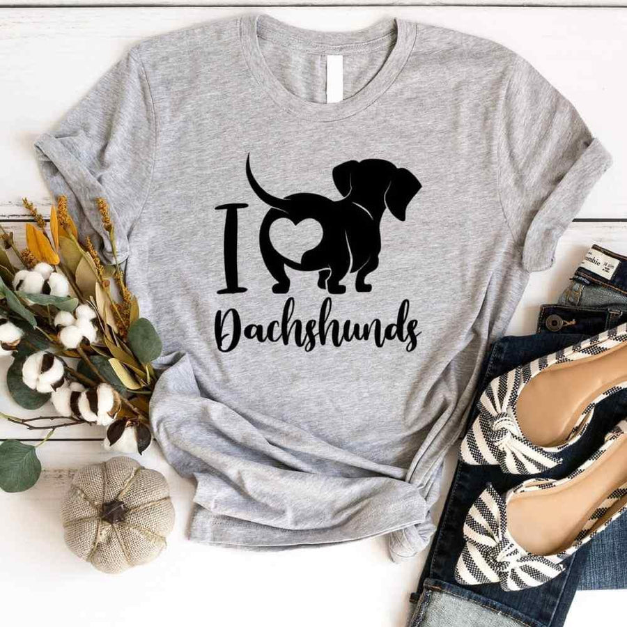 May include a graphic t-shirt with the phrase “I Love Dachshunds” displayed on the front.