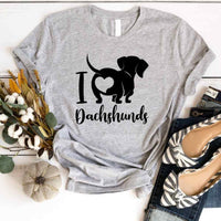 May include a graphic t-shirt with the phrase “I Love Dachshunds” displayed on the front.