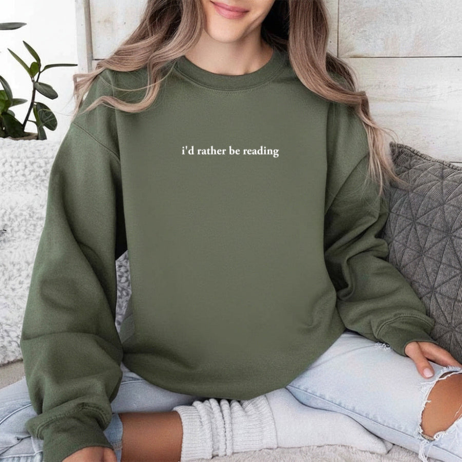 May include an I’d Rather Be Reading Book Lover Sweatshirt featuring a classic reading-inspired statement design on a cozy pullover.