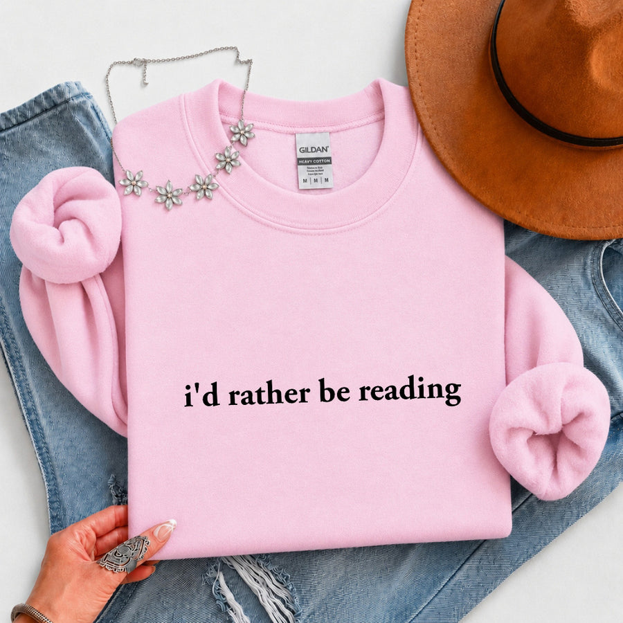 May include an I’d Rather Be Reading Book Lover Sweatshirt featuring a classic reading-inspired statement design on a cozy pullover.