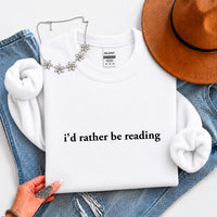 May include an I’d Rather Be Reading Book Lover Sweatshirt featuring a classic reading-inspired statement design on a cozy pullover.